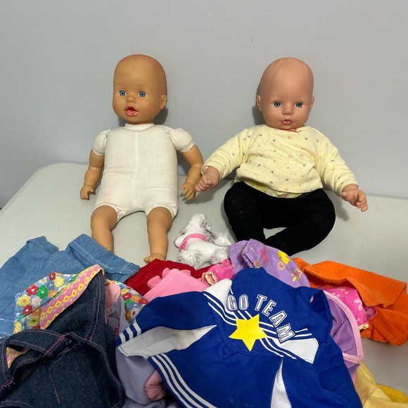 2 Adorable Baby Dolls with a bag full of Colorful clothes - Picture 2 of 3